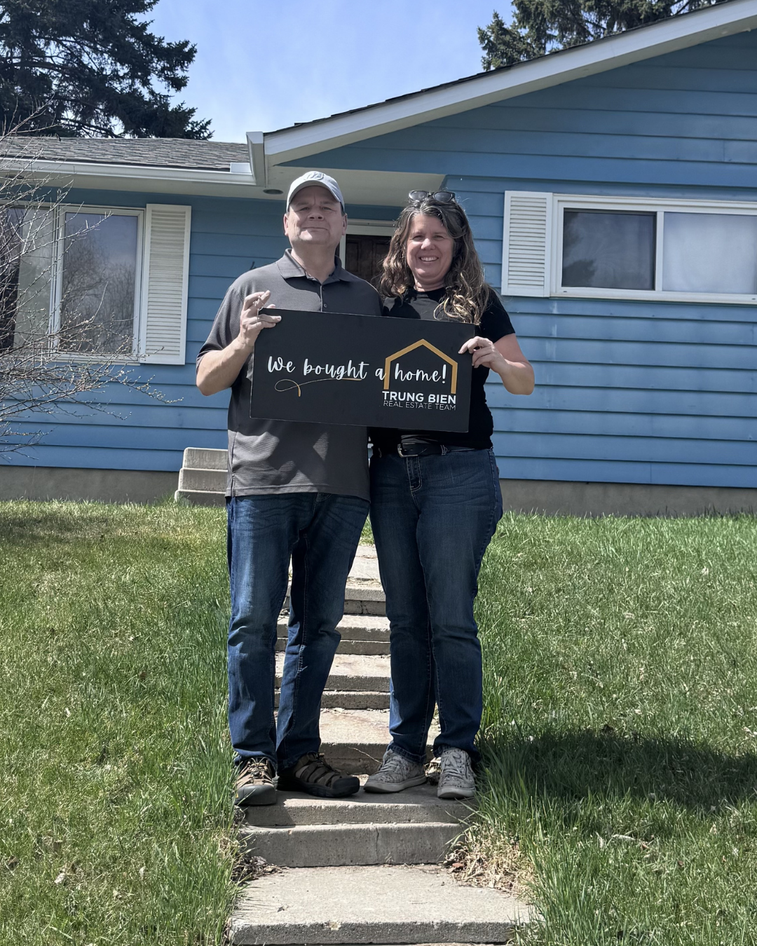 Trung Bien with client after buying their home